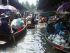 The boat navigated through narrow canals for 10 minutes before reaching this market